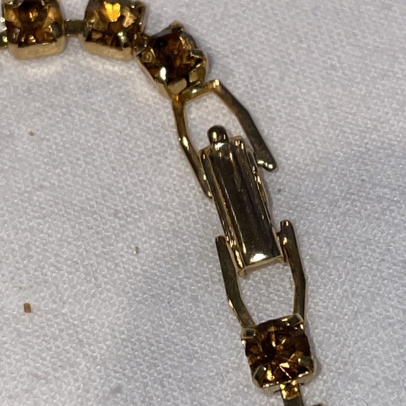 Gold plated prong set burgundy round rhinestone chain fold over clasp bracelet - Picture 2 of 3